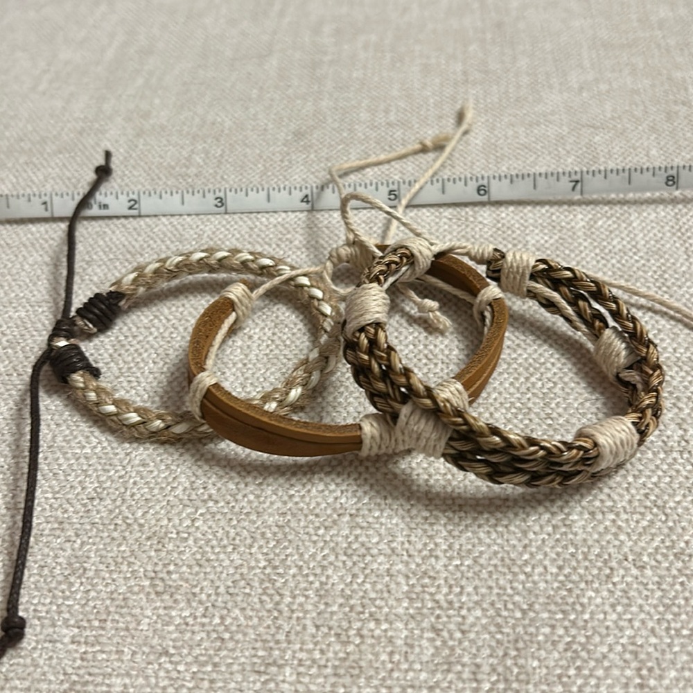 Set of 3 bracelets made of string and leather